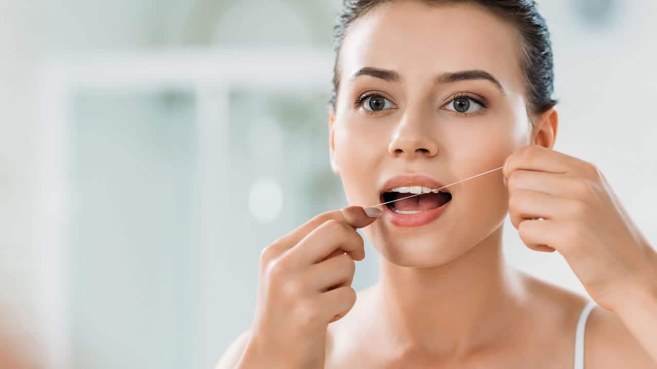 The Link Between Poor Flossing and Gum Disease Guildford